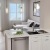 a kitchen with white cabinets