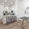 a dining area next to a kitchen