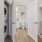 large walk-in closet with washer/dryer